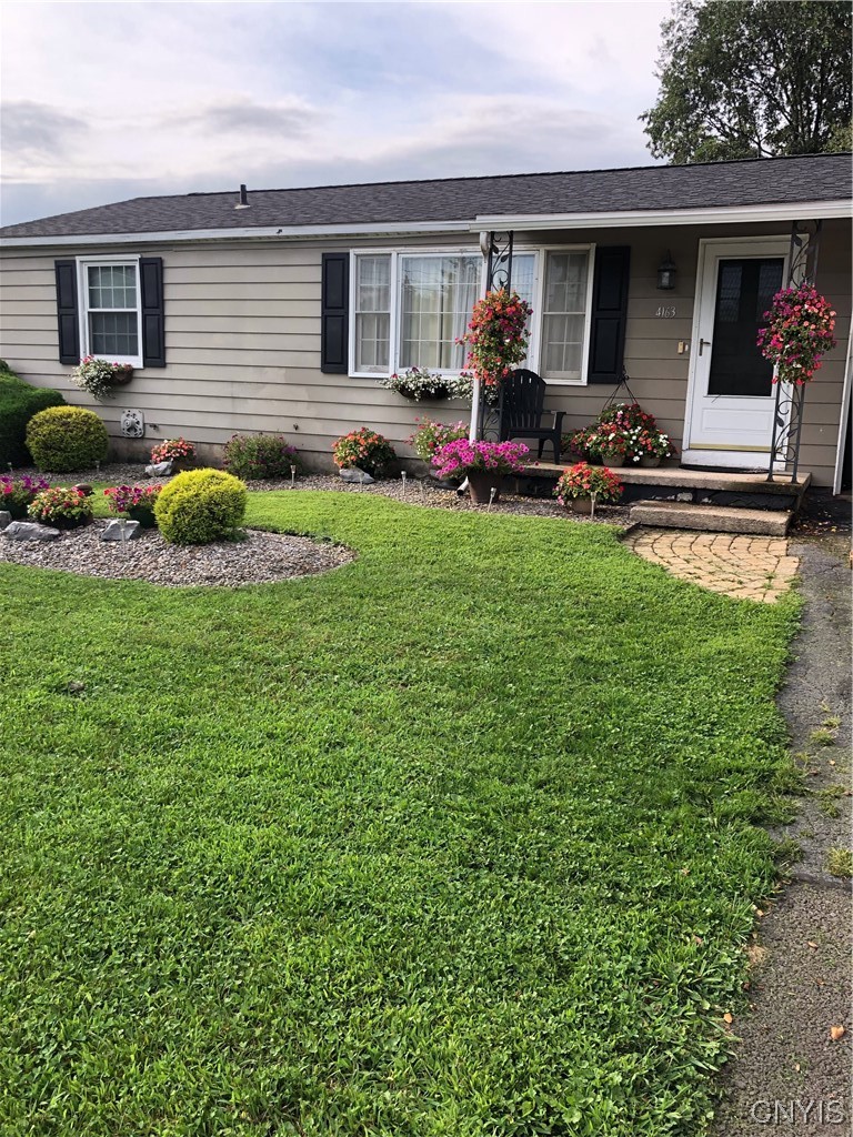 4163 Wetzel Road Clay, NY 13090 - Photo 1 of 1 Front with Landscaping