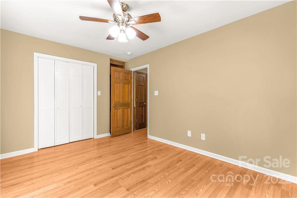 1907 Hickory Drive Lancaster, SC 29720 - Photo 19 of 39 a view of empty room with wooden floor
