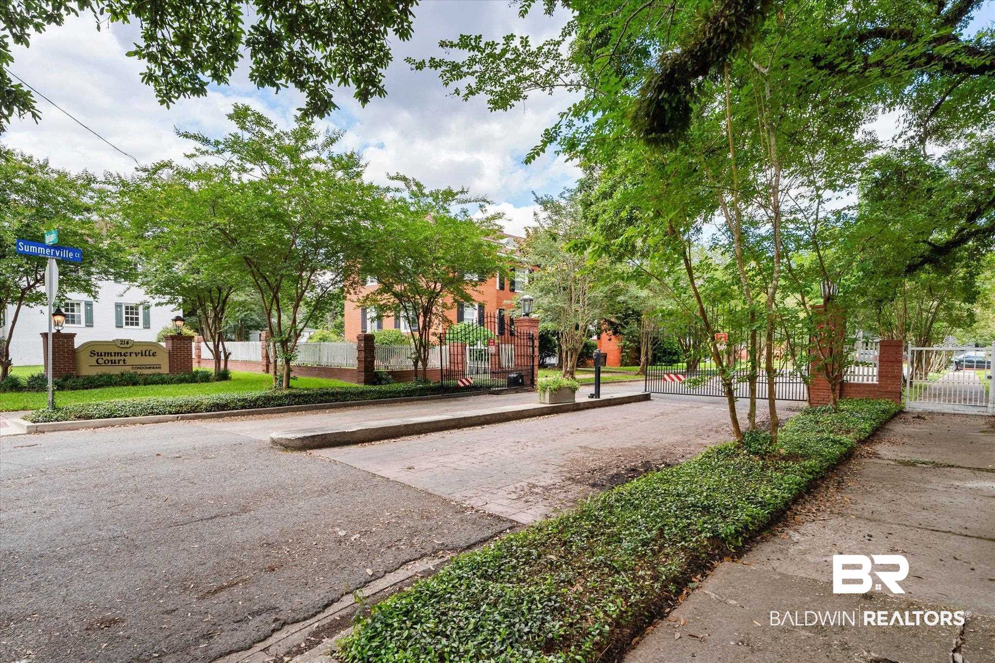 214 Upham Street, Unit 18C Mobile, AL 36607 - Photo 22 of 35 View of community with a gate and fence