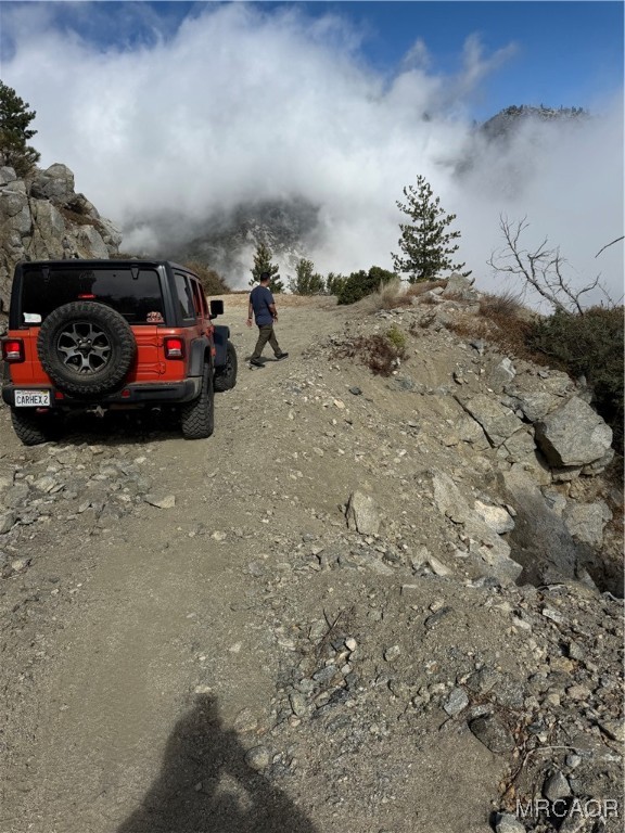 0 Lytle Creek Road Lytle Creek, CA 92358 - Photo 4 of 7 a view of a parking space with a car parked