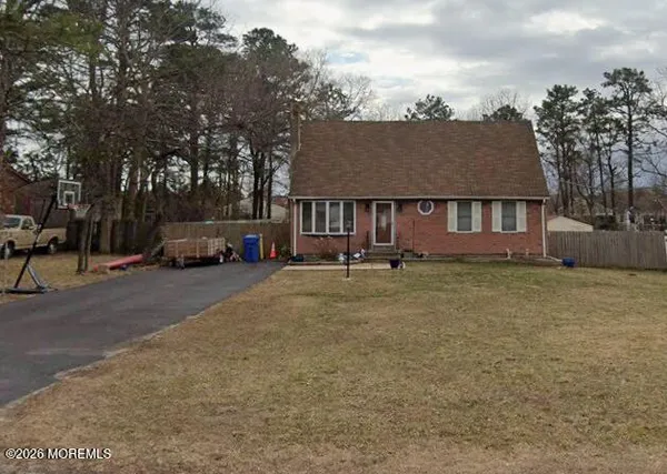 a view of street with parked cars