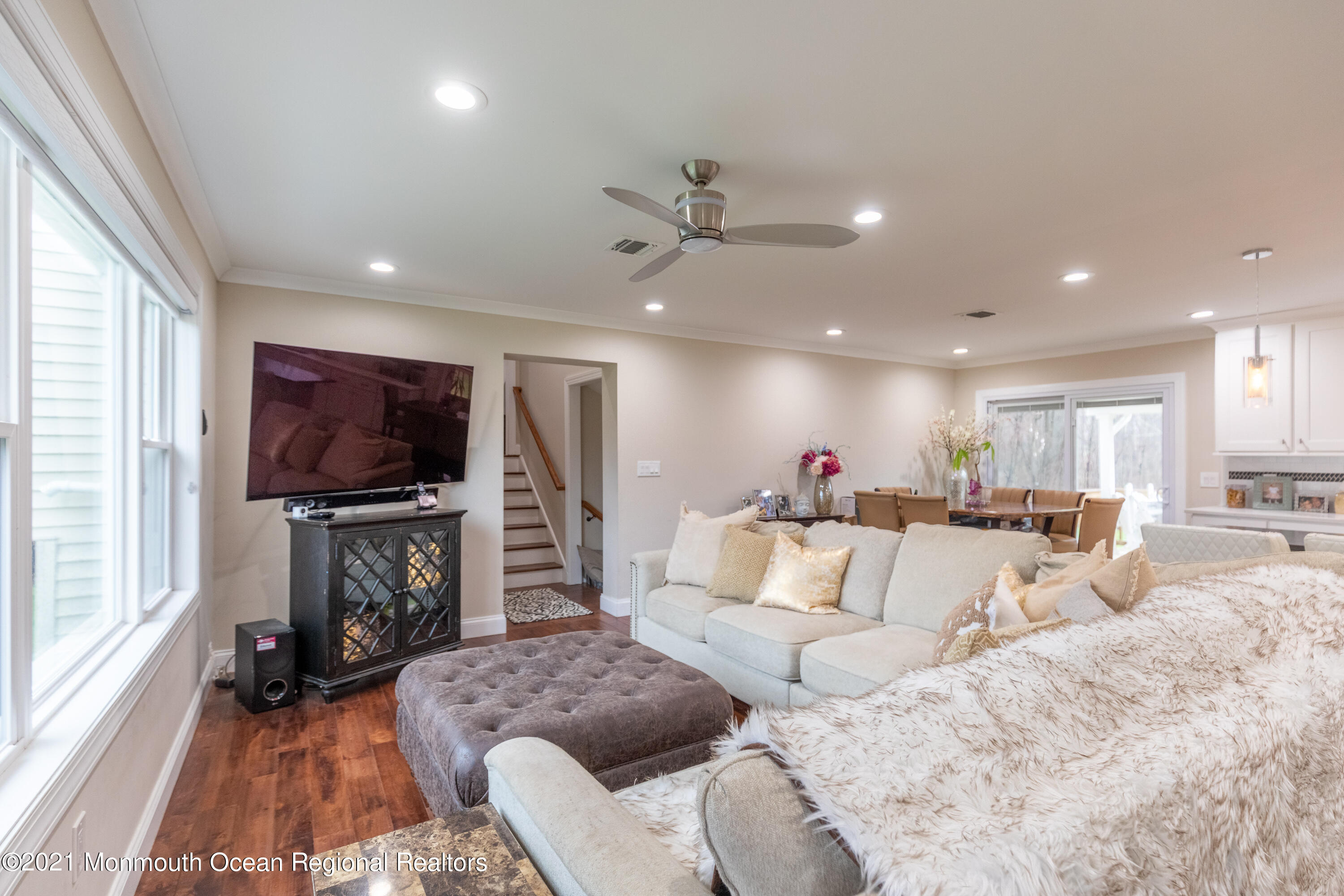 178 Bennett Road Freehold, NJ 07728 - Photo 3 of 22 a living room with furniture and a flat screen tv