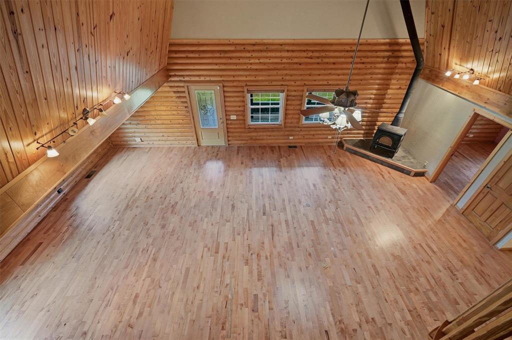 570 Ayres Road Bells, TX 75414 - Photo 27 of 40 a view of a hall with wooden floor
