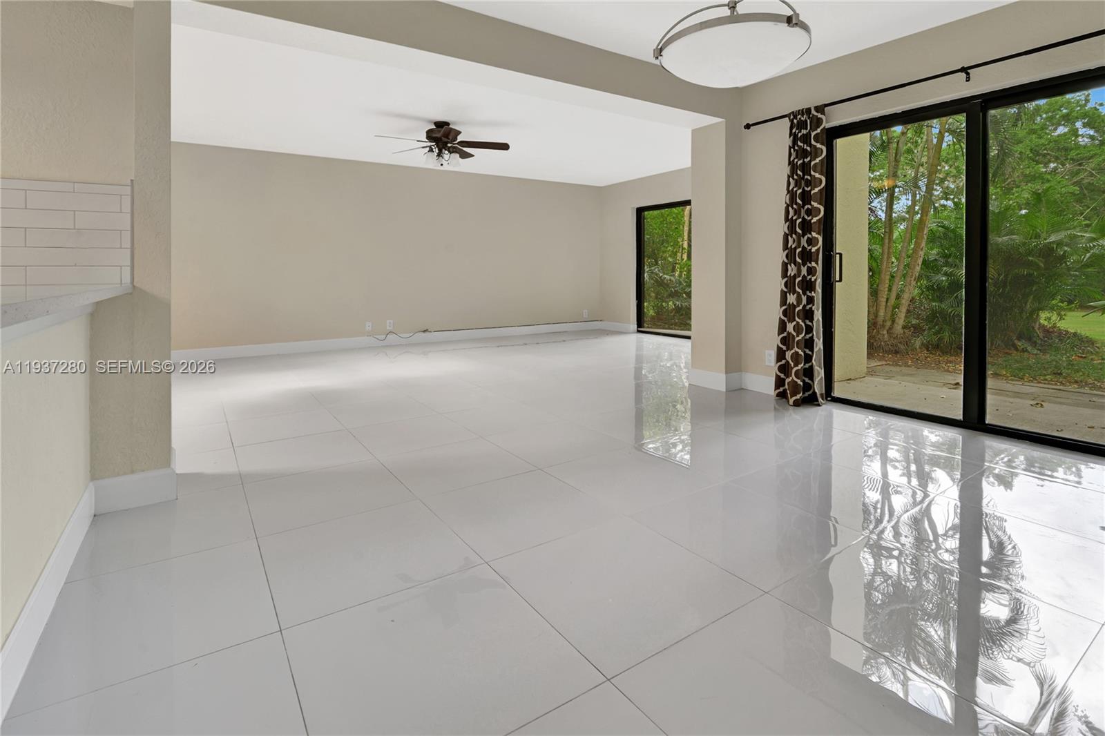 3114 Kingswood Terrace Boca Raton, FL 33431 - Photo 13 of 40 a view of an empty room with a window