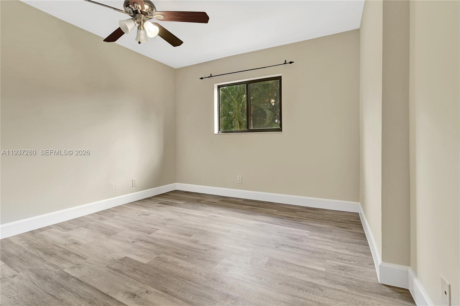 3114 Kingswood Terrace Boca Raton, FL 33431 - Photo 25 of 40 wooden floor in an empty room