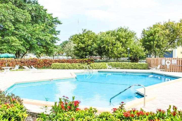 3114 Kingswood Terrace Boca Raton, FL 33431 - Photo 34 of 40 a view of a tennis court