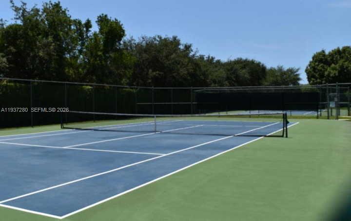 3114 Kingswood Terrace Boca Raton, FL 33431 - Photo 35 of 40 a view of a tennis court