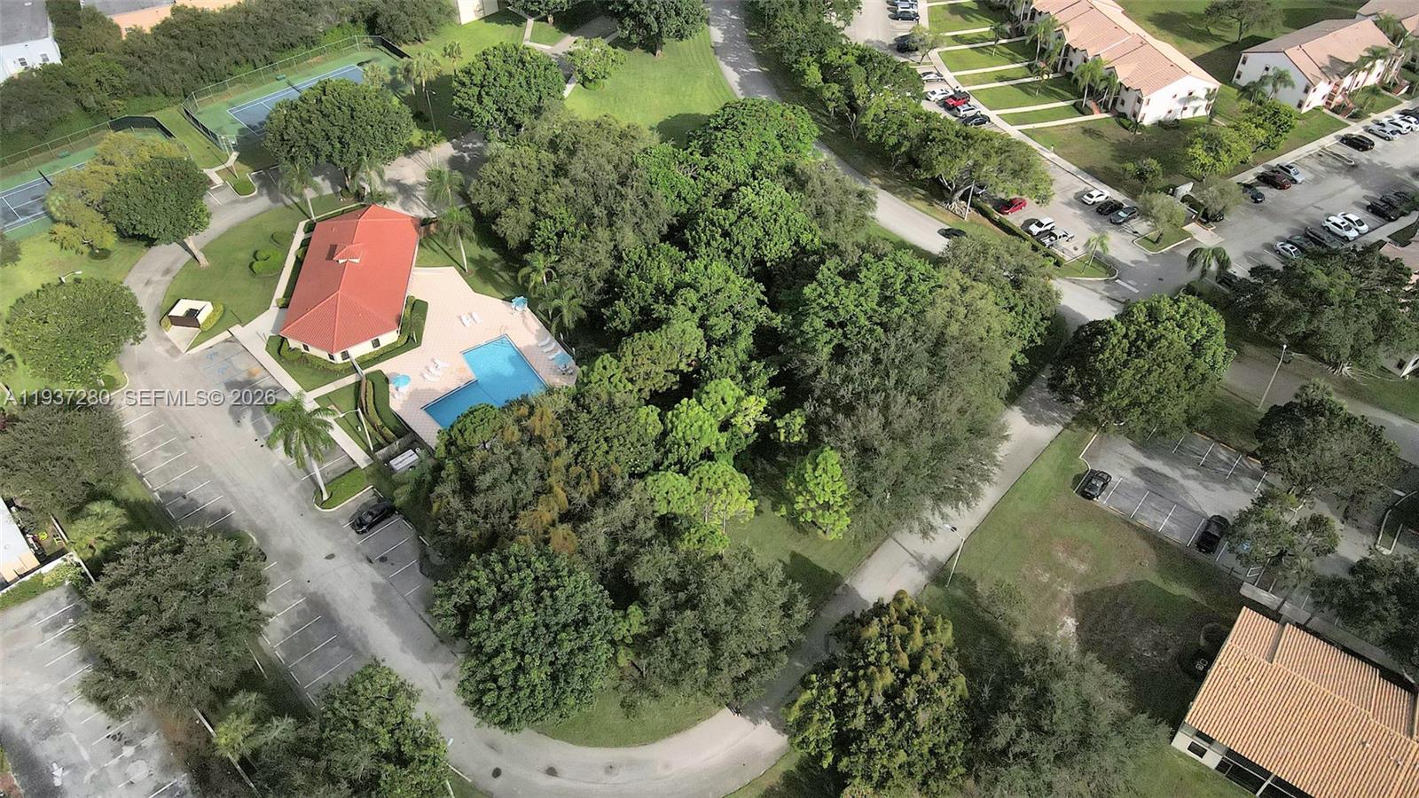 3114 Kingswood Terrace Boca Raton, FL 33431 - Photo 37 of 40 an aerial view of a house with a yard and outdoor seating