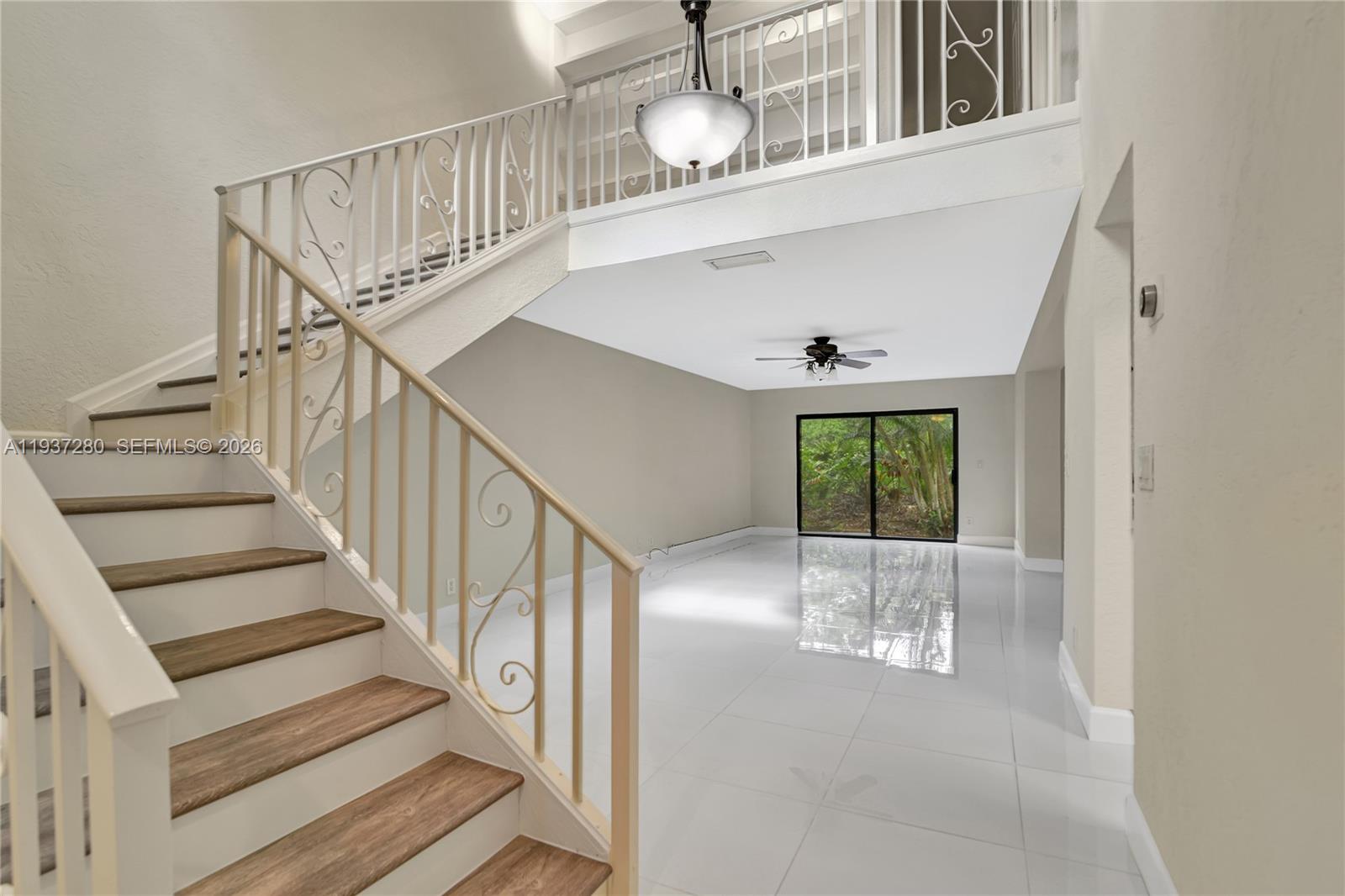 3114 Kingswood Terrace Boca Raton, FL 33431 - Photo 10 of 40 a view of entryway and hall with wooden floor