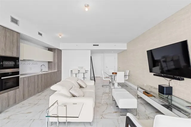 a spacious bathroom with a double vanity sink mirror and double