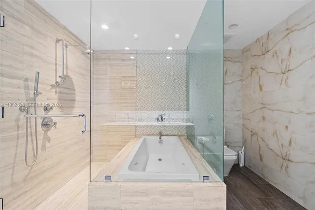 a view of balcony with wooden floor