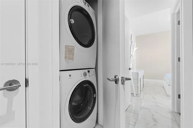 a view of a lake with couches and city view