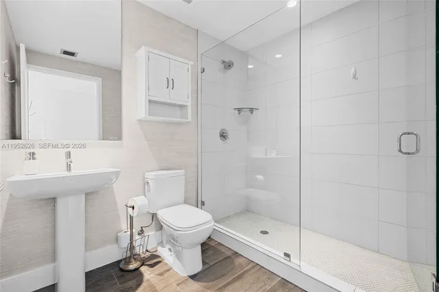 a view of a swimming pool with a yard