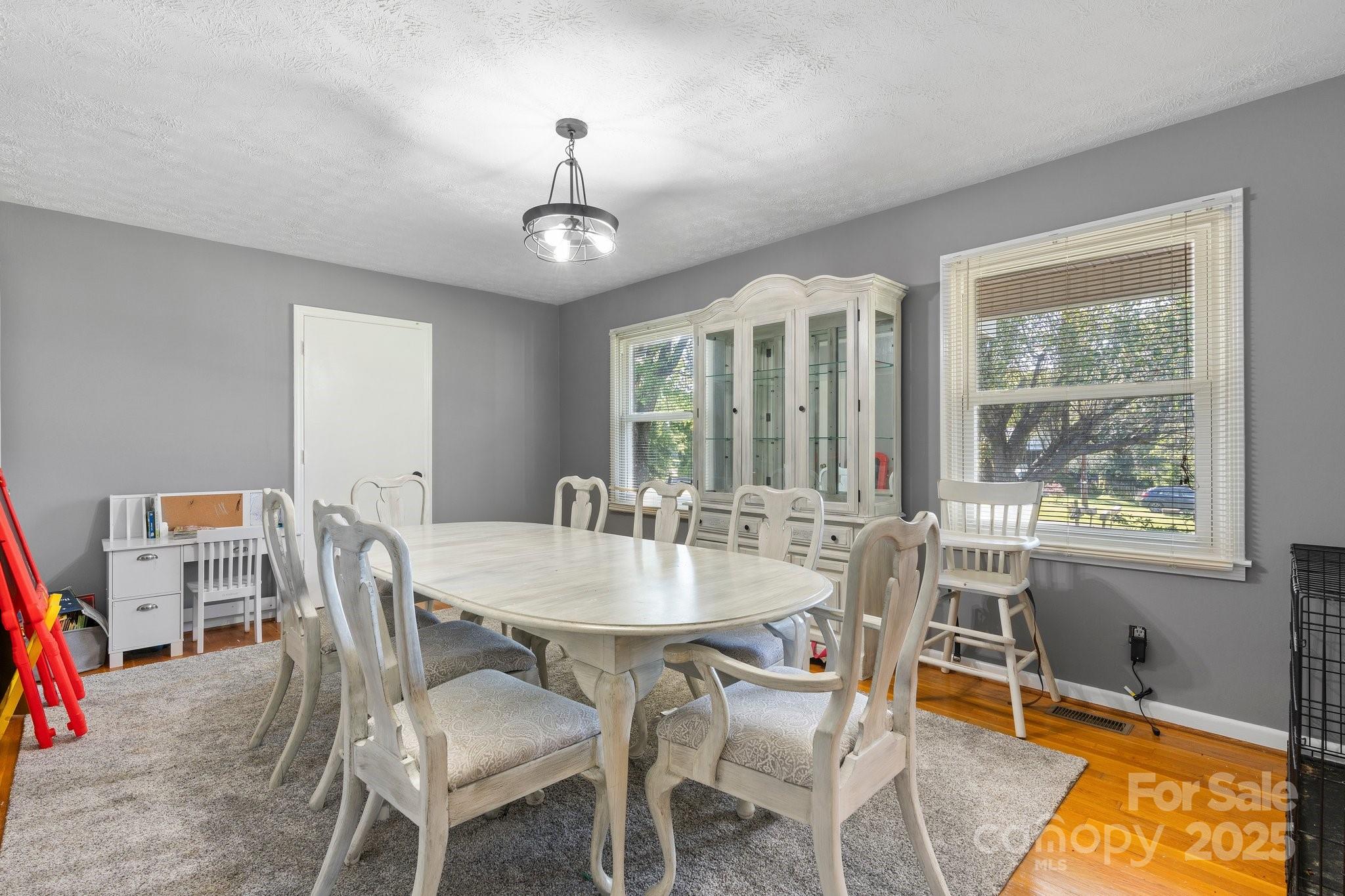2596 Sweetbriar Circle Lenoir, NC 28645 - Photo 13 of 47 a view of a dining room with furniture window and outside view