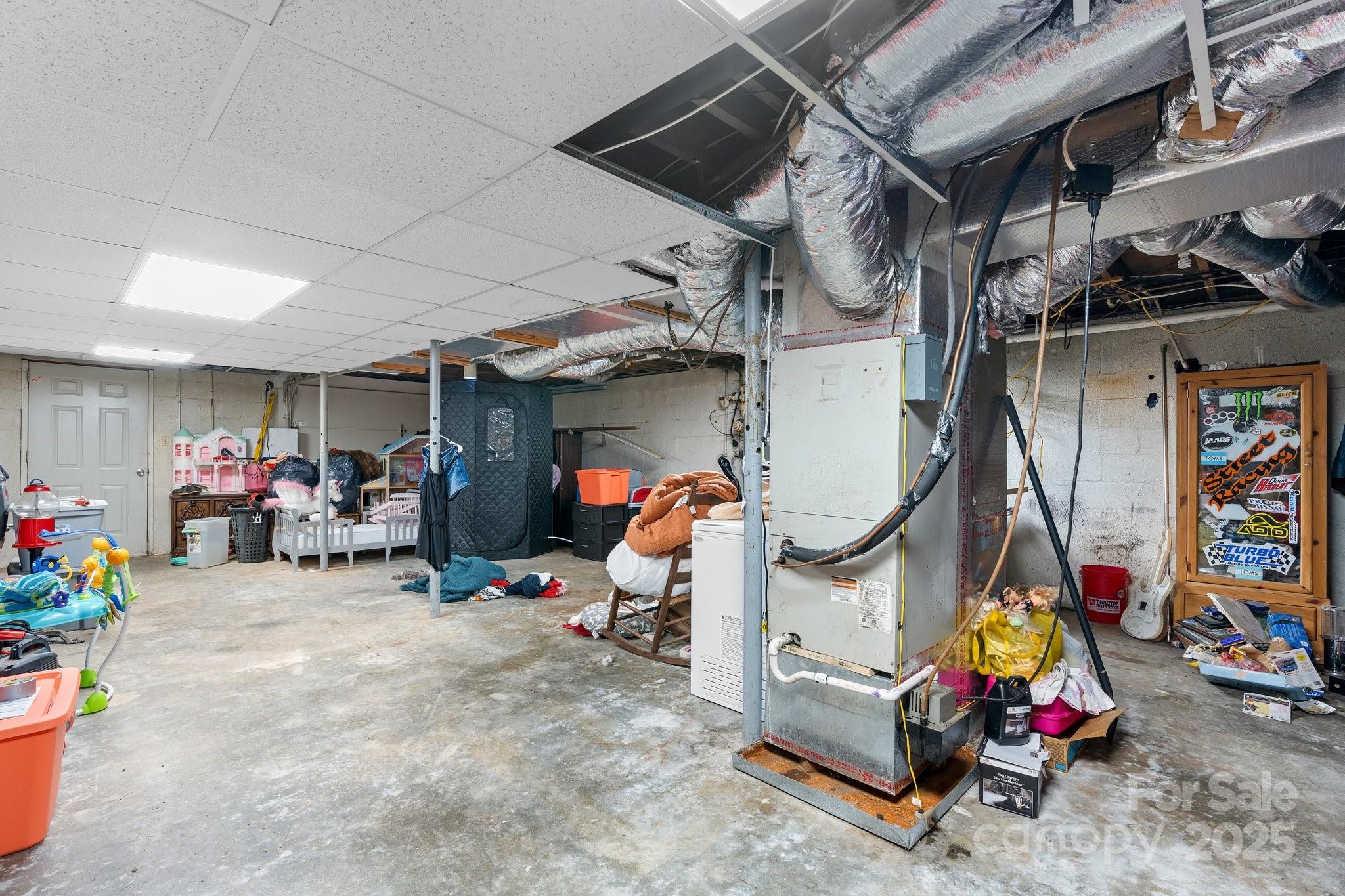 2596 Sweetbriar Circle Lenoir, NC 28645 - Photo 22 of 47 a storage room with lots of stuff