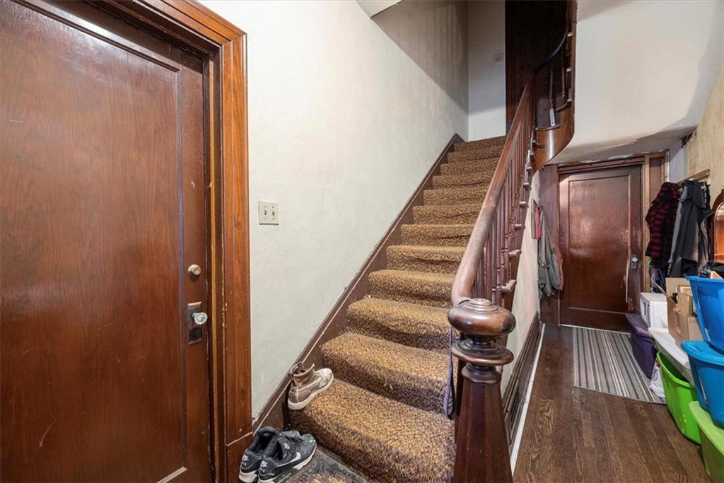 125 Center Avenue Burgettstown, PA 15021 - Photo 17 of 32 a view of staircase with wooden floor and stairs