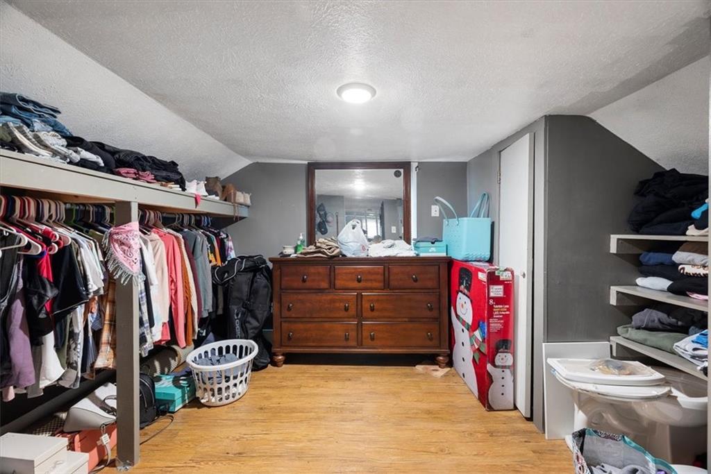 125 Center Avenue Burgettstown, PA 15021 - Photo 28 of 32 a bed room with a bed and a walk in closet