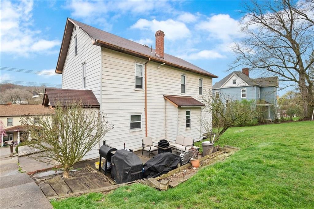 125 Center Avenue Burgettstown, PA 15021 - Photo 29 of 32 a view of a house with a backyard