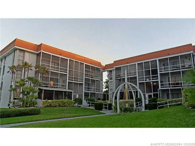 a black and white photo of a big room