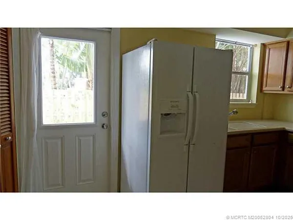 a black and white photo of a bathroom