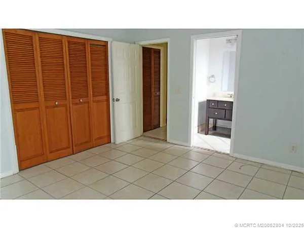 a black and white photo of a house