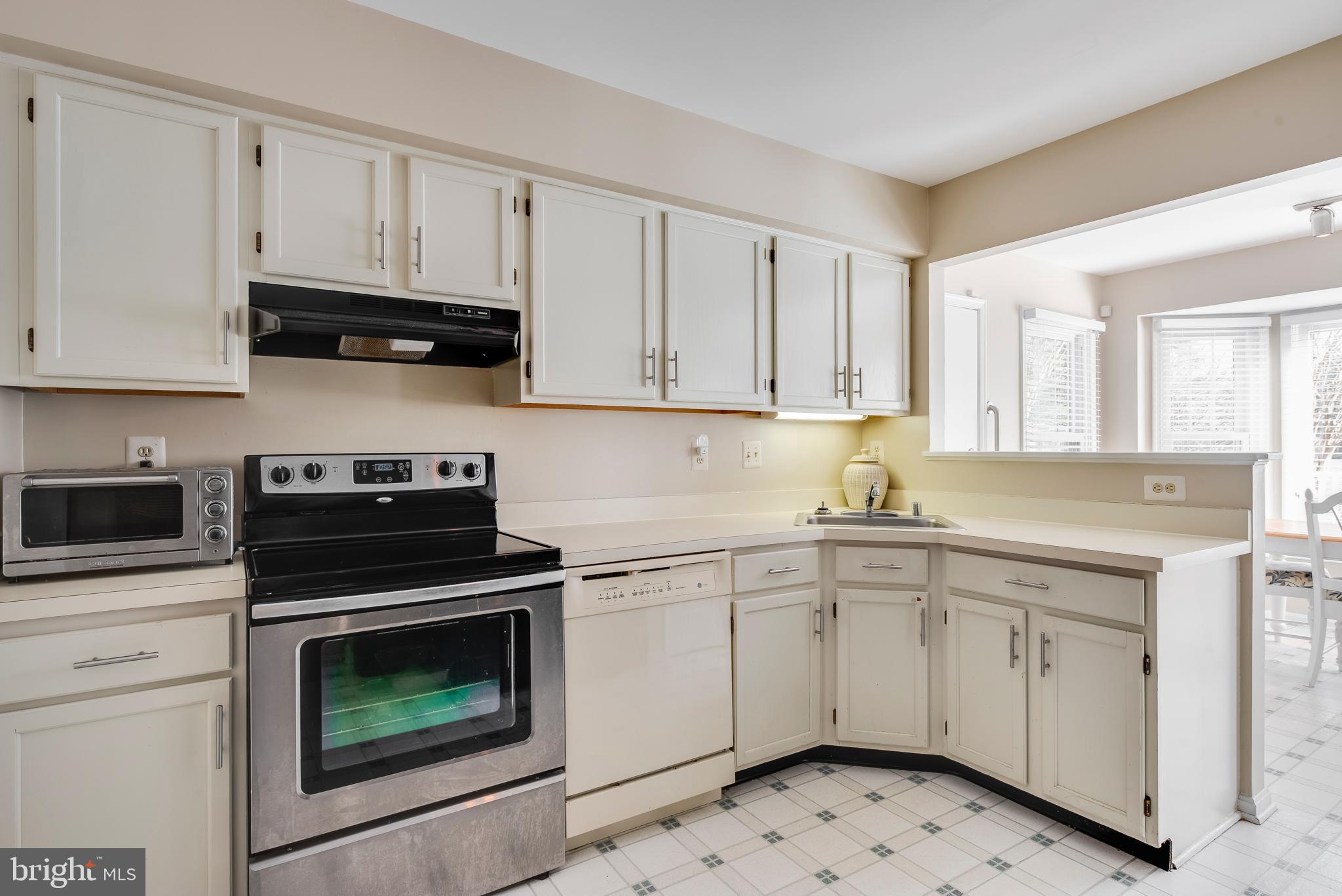 314 Canterfield Road Annapolis, MD 21403 - Photo 4 of 37 a kitchen with cabinets appliances and a sink