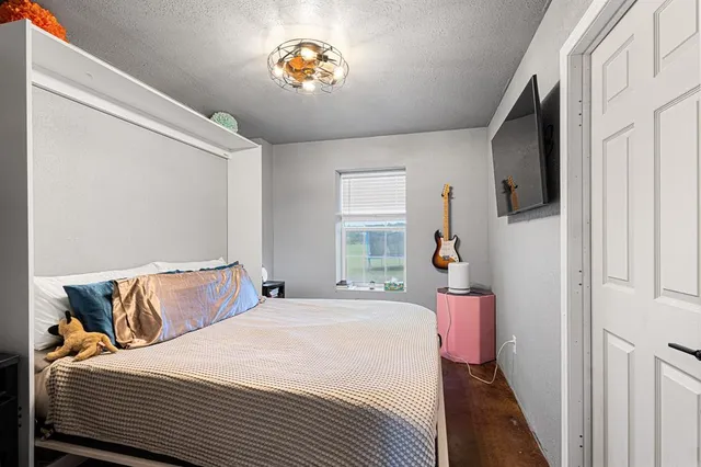 a bathroom with a shower and a sink
