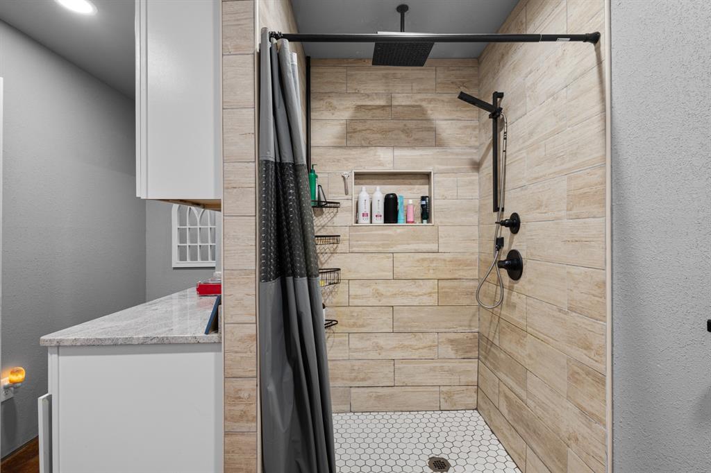 14293 South Fm 372 Valley View Valley View, TX 76272 - Photo 32 of 35 a bathroom with a shower and a sink