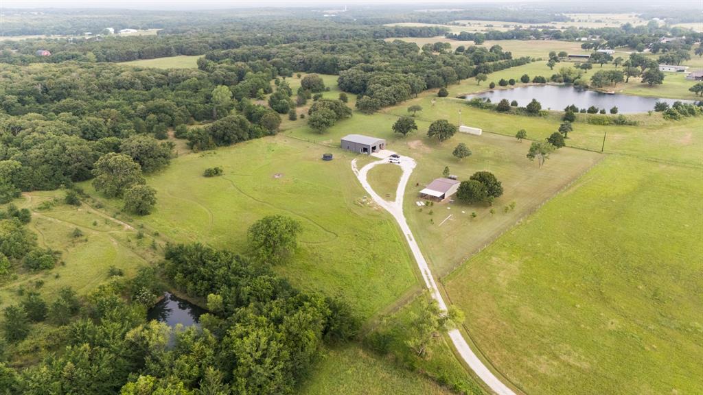 14293 South Fm 372 Valley View Valley View, TX 76272 - Photo 6 of 35 an aerial view of residential houses with outdoor space