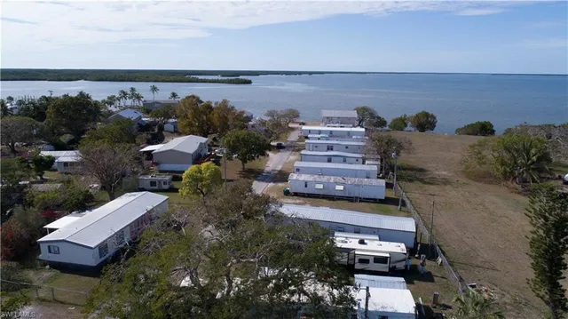 an aerial view of a house with outdoor space