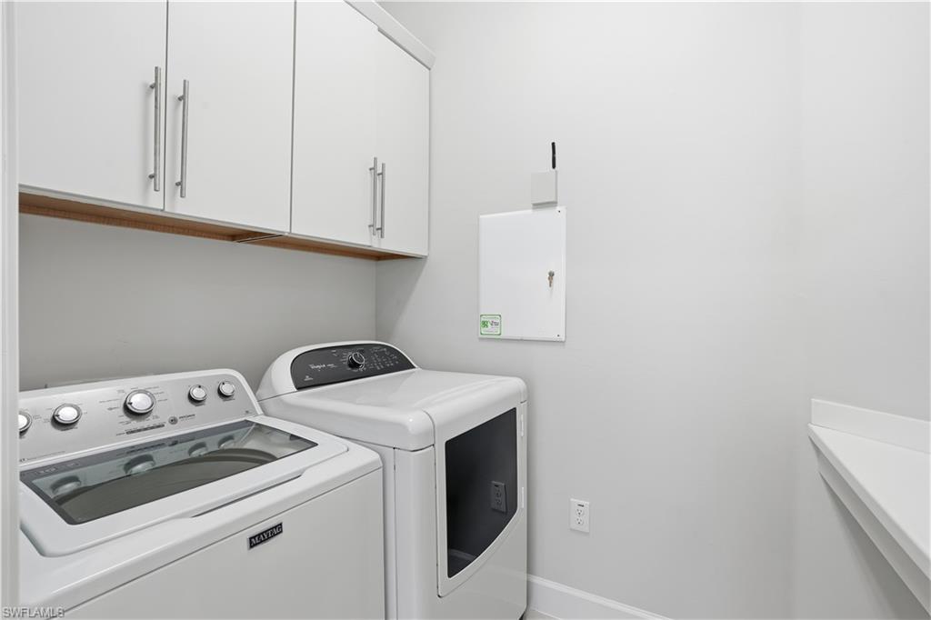 9328 Fieldstone Lane Naples, FL 34120 - Photo 23 of 40 a view of washer and dryer