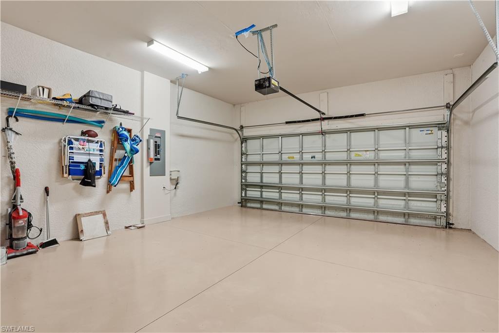 9328 Fieldstone Lane Naples, FL 34120 - Photo 24 of 40 a view of a garage with storage