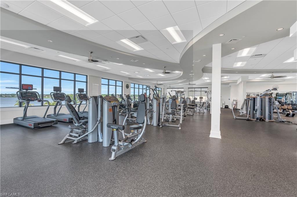 9328 Fieldstone Lane Naples, FL 34120 - Photo 30 of 40 a view of a room with gym equipment