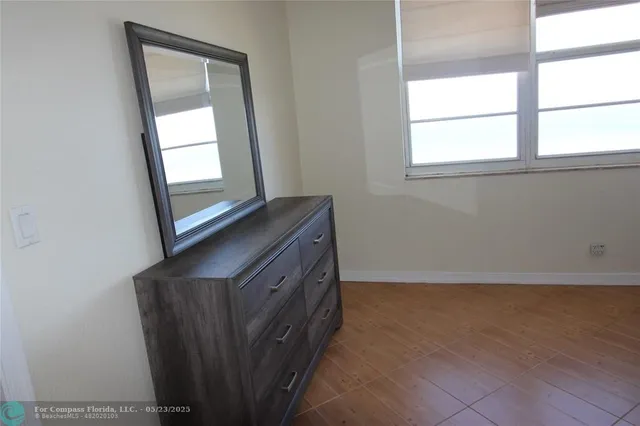 a view of an empty room and window