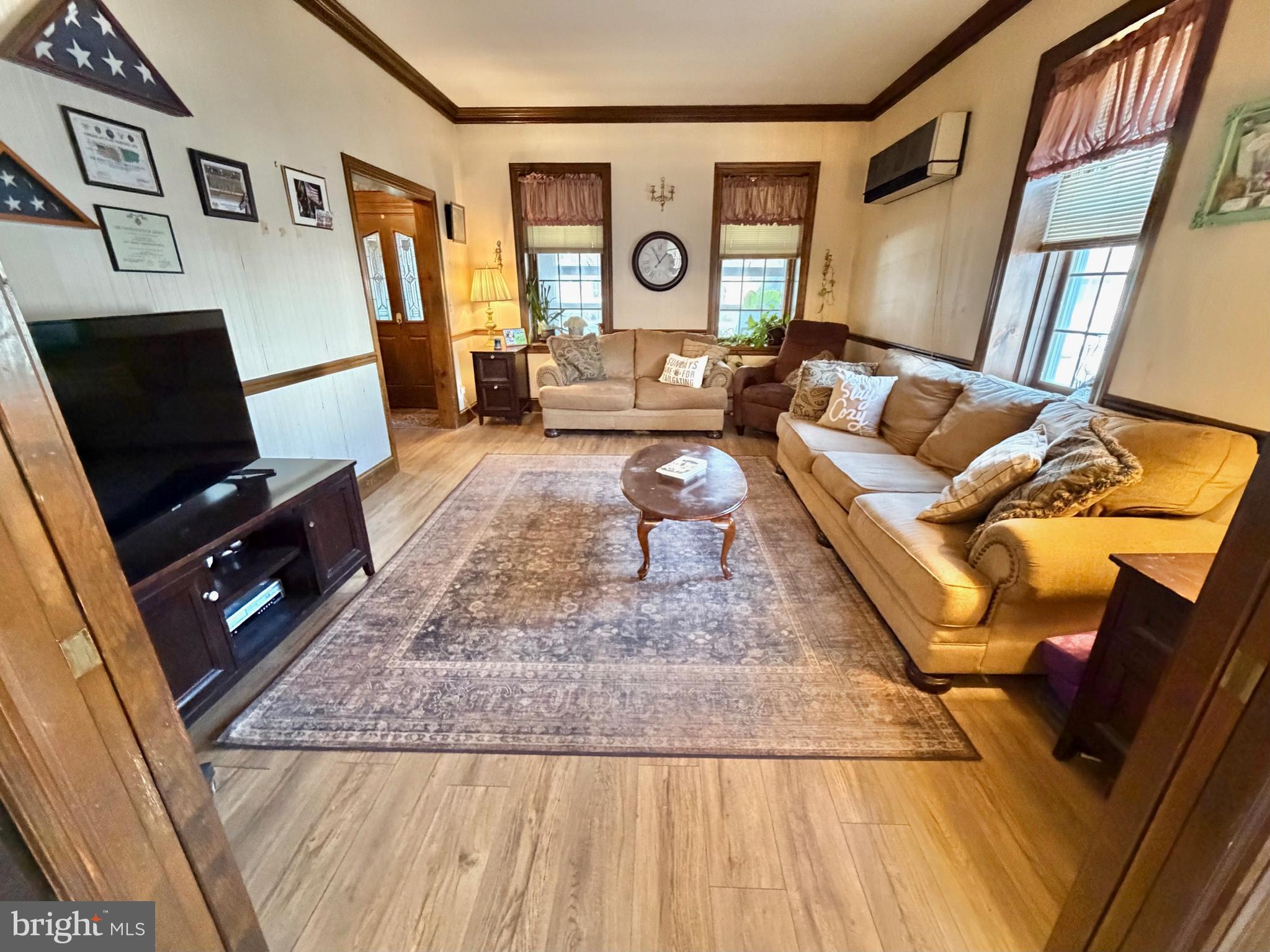 126 4th Avenue Roebling, NJ 08554 - Photo 11 of 43 a living room with furniture and a flat screen tv