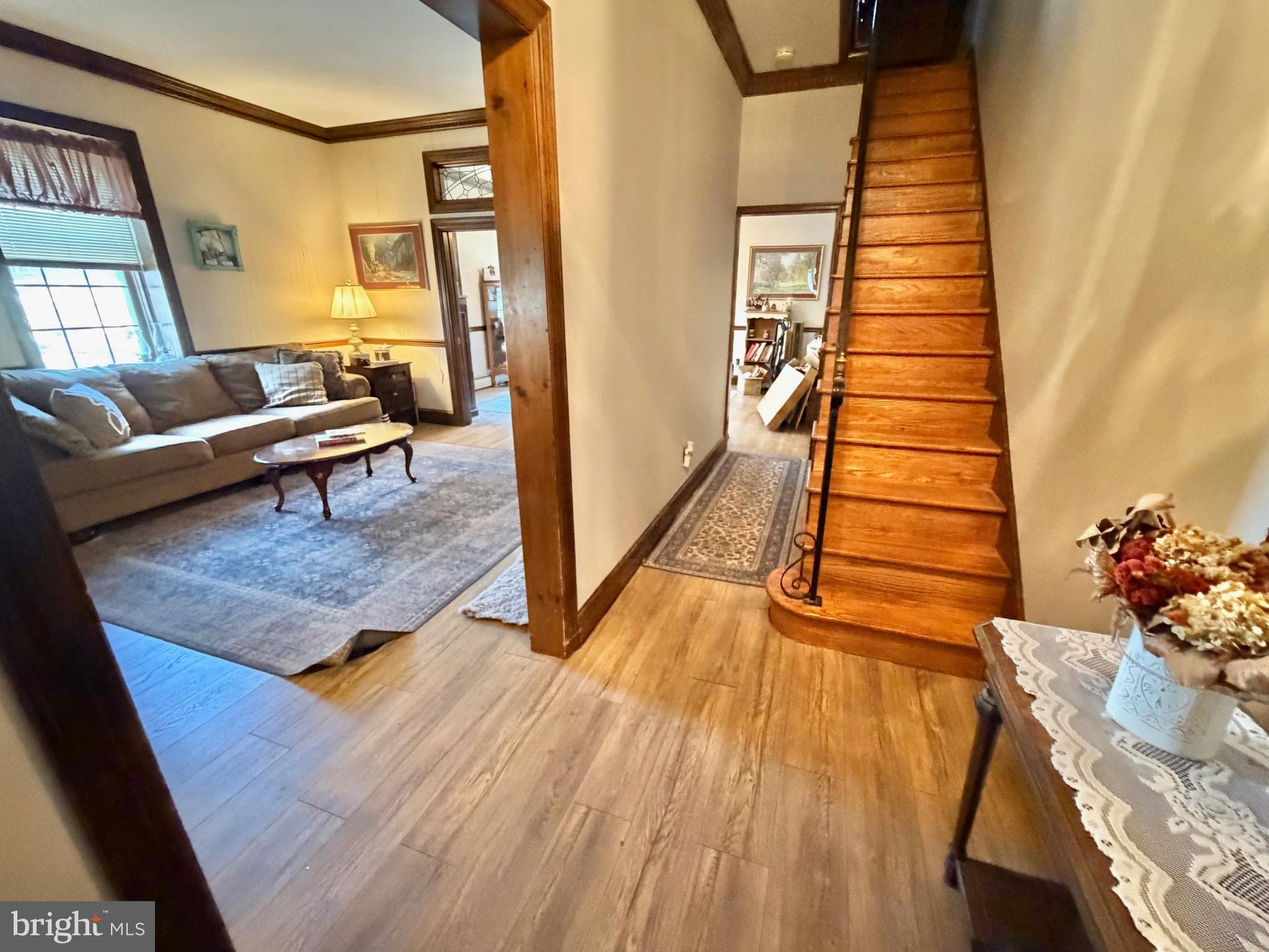 126 4th Avenue Roebling, NJ 08554 - Photo 12 of 43 a living room with furniture and a wooden floor