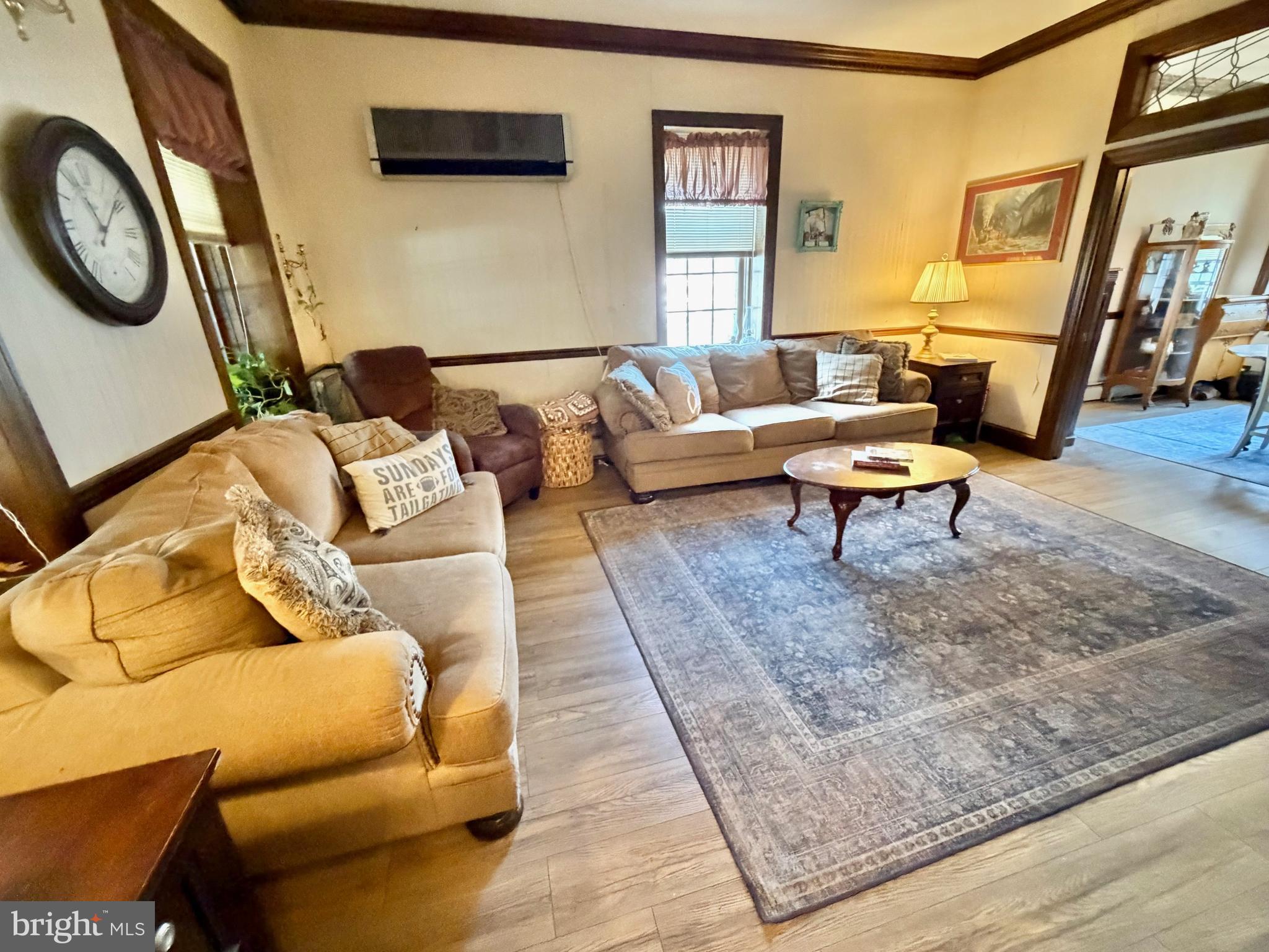 126 4th Avenue Roebling, NJ 08554 - Photo 15 of 43 a living room with furniture and a flat screen tv