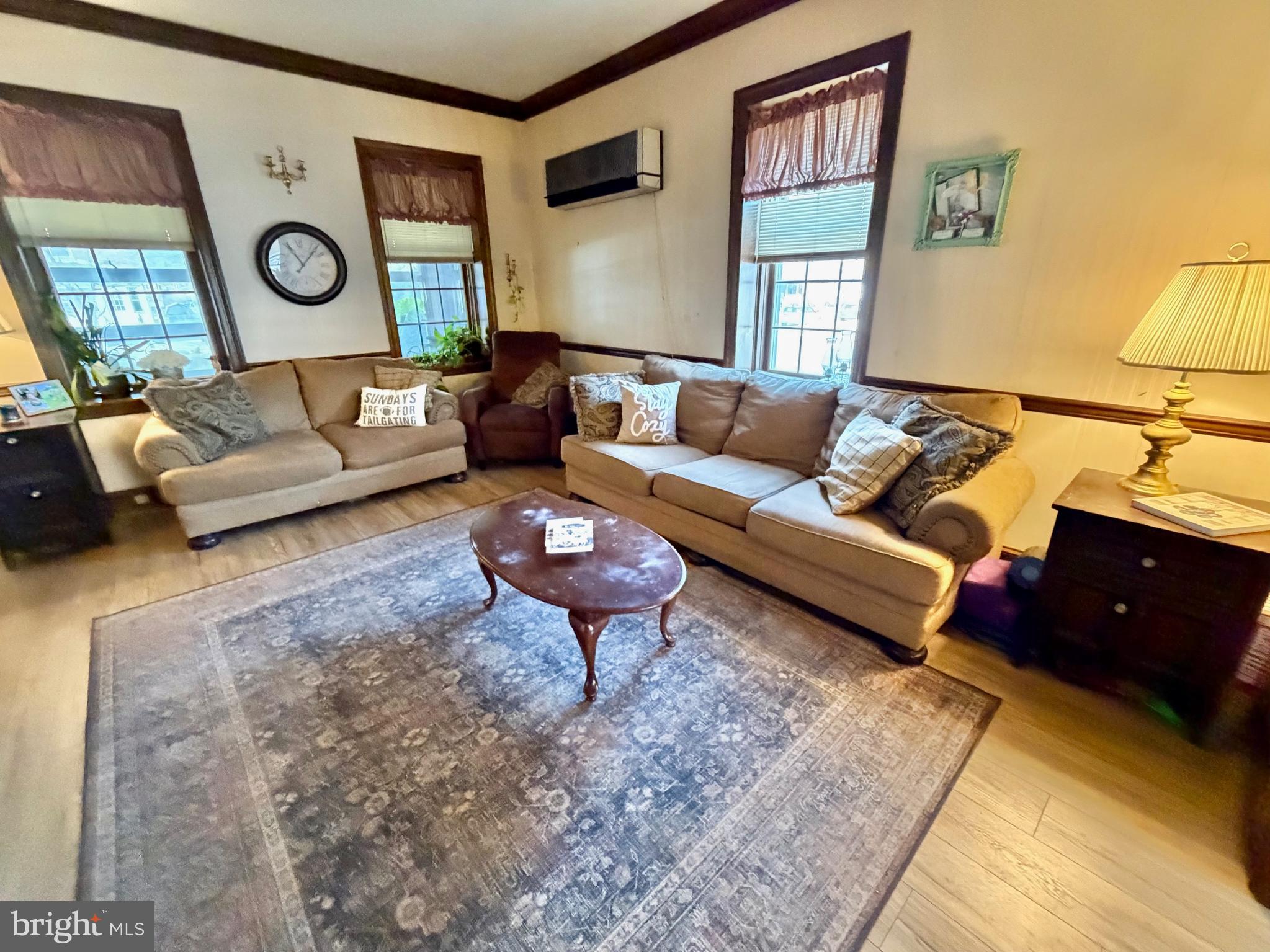 126 4th Avenue Roebling, NJ 08554 - Photo 16 of 43 a living room with furniture and wooden floor