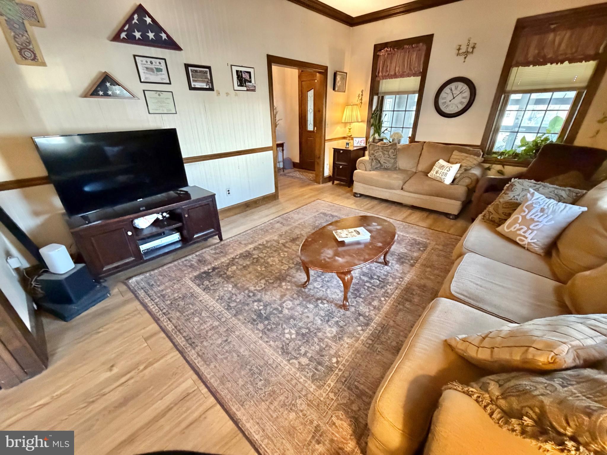 126 4th Avenue Roebling, NJ 08554 - Photo 17 of 43 a living room with furniture and a flat screen tv