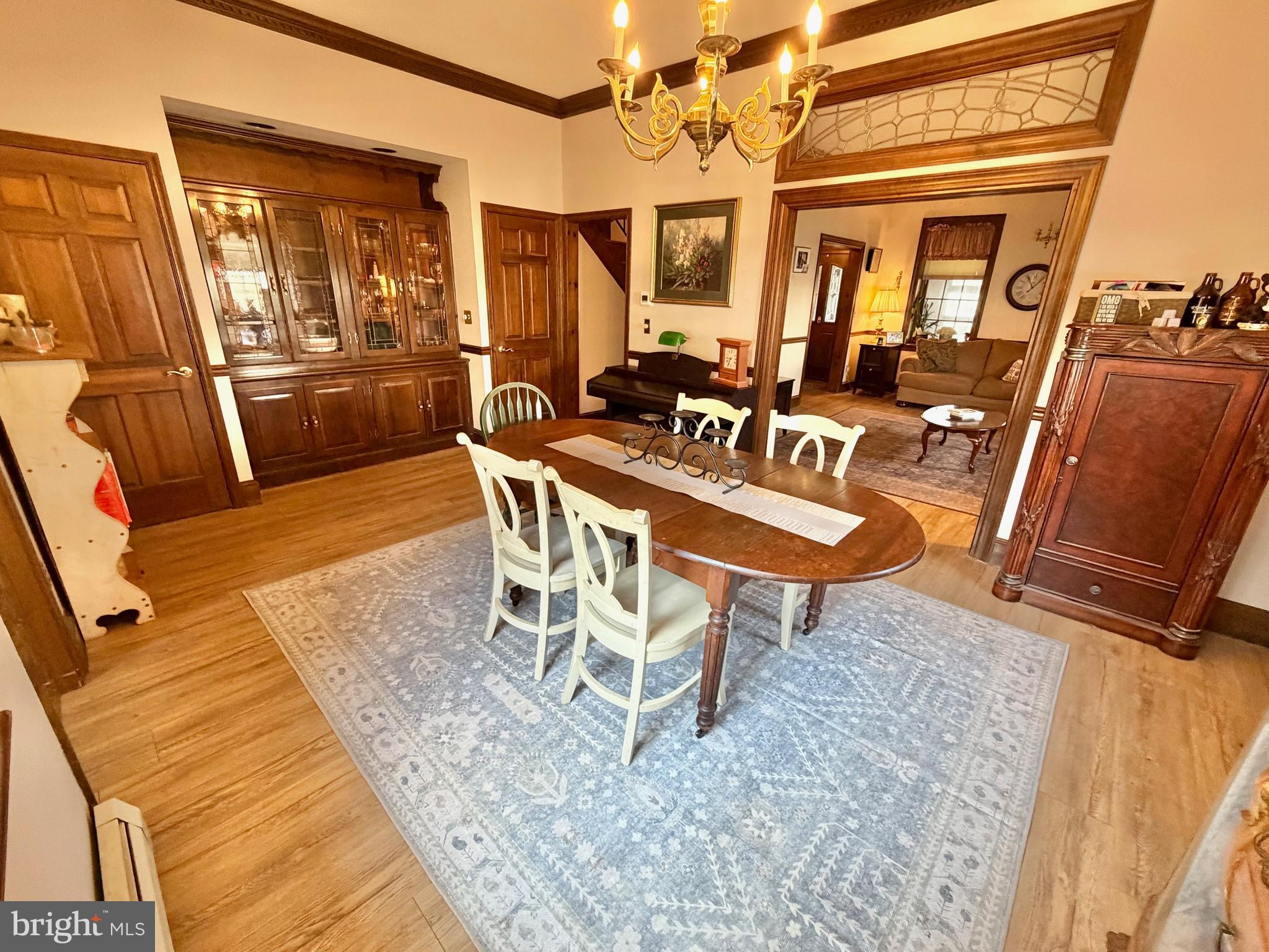 126 4th Avenue Roebling, NJ 08554 - Photo 19 of 43 a view of a dining room with furniture window and wooden floor