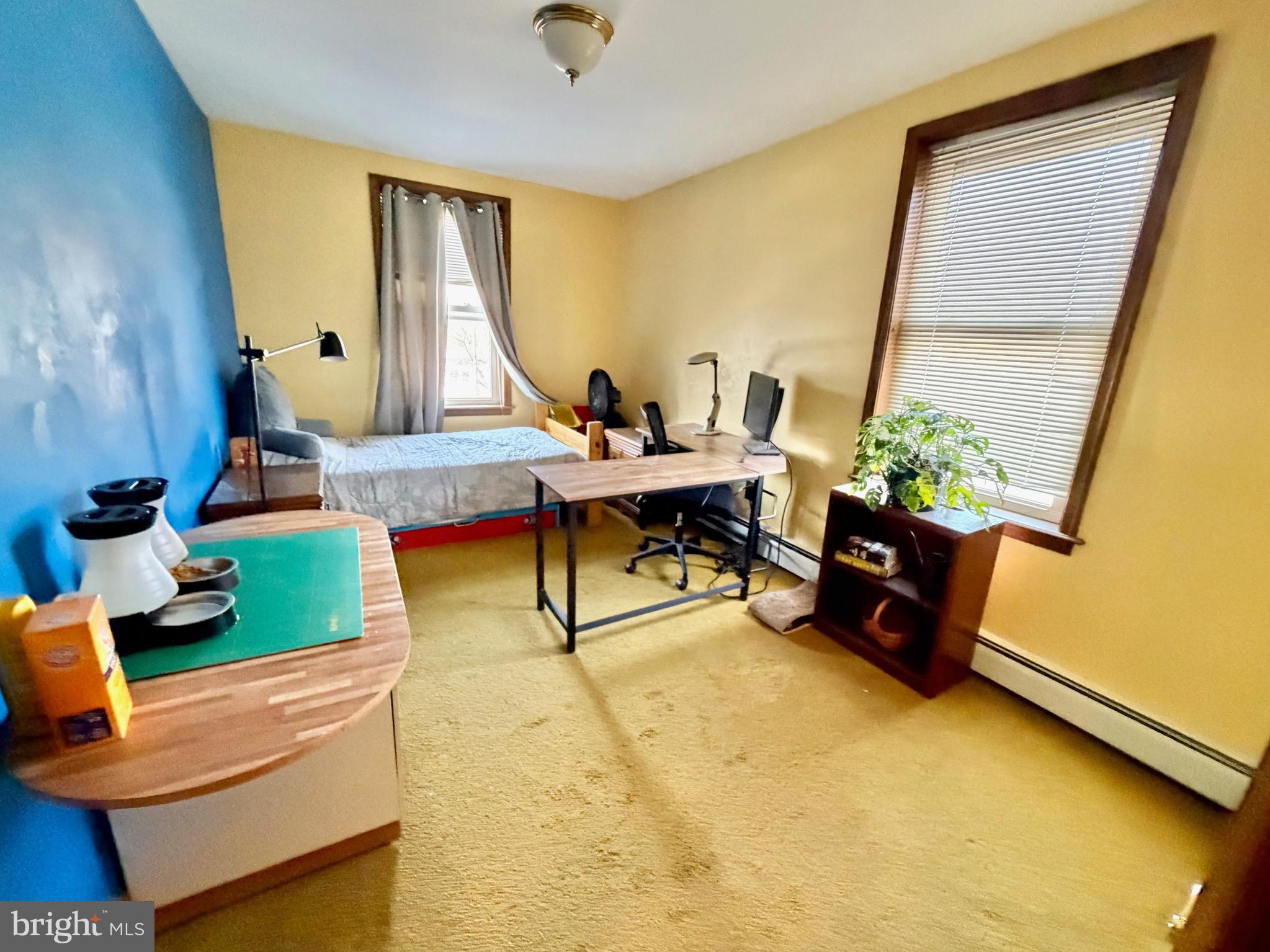 126 4th Avenue Roebling, NJ 08554 - Photo 26 of 43 a living room with furniture and a window