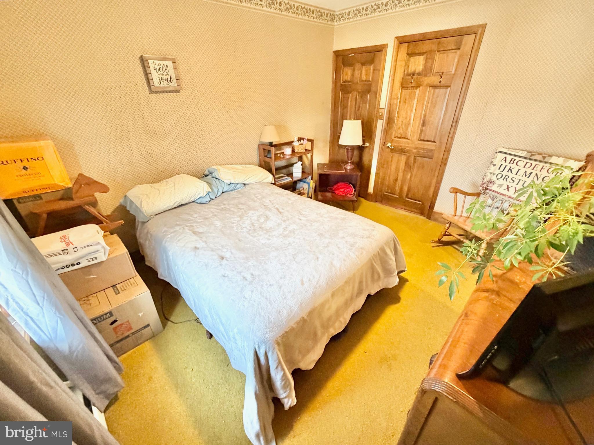 126 4th Avenue Roebling, NJ 08554 - Photo 29 of 43 a bed sitting in a bedroom next to a window