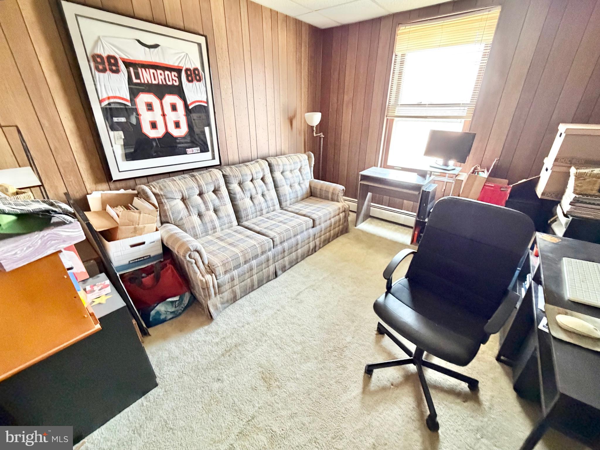 126 4th Avenue Roebling, NJ 08554 - Photo 30 of 43 a living room with furniture and a window