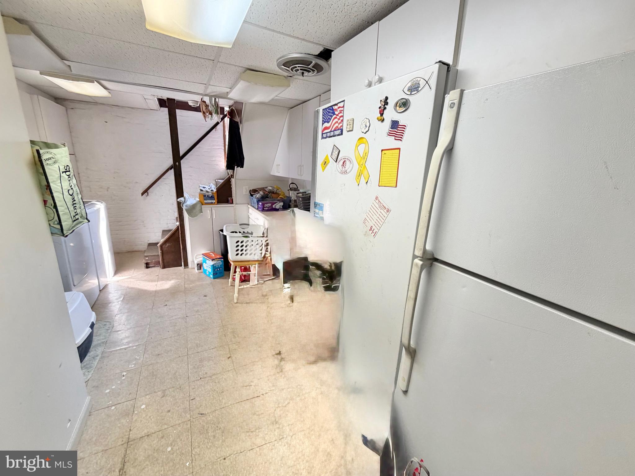 126 4th Avenue Roebling, NJ 08554 - Photo 34 of 43 a view of walk in closet with refrigerator and dryer