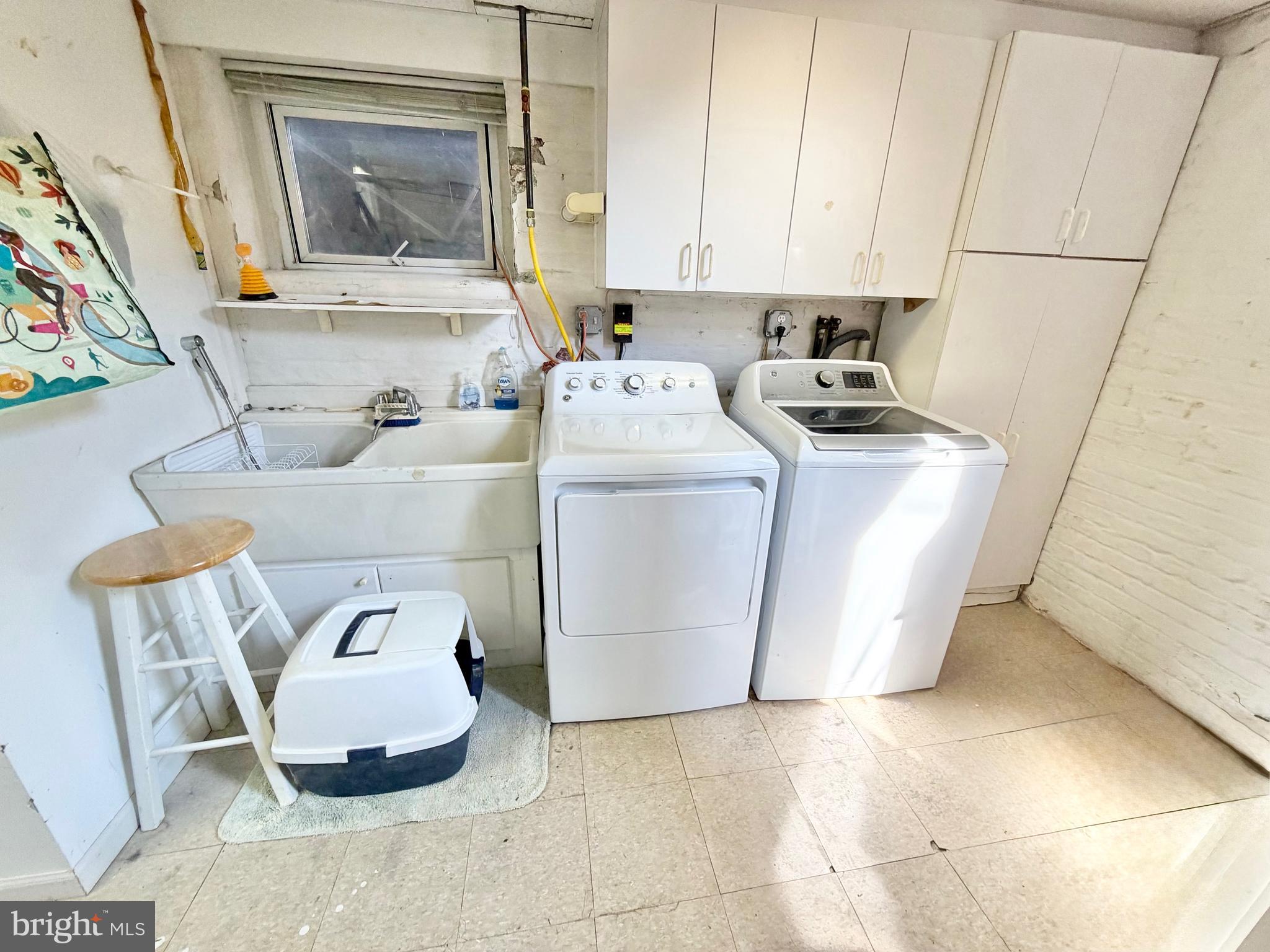 126 4th Avenue Roebling, NJ 08554 - Photo 35 of 43 a room with a washing machine and cabinets