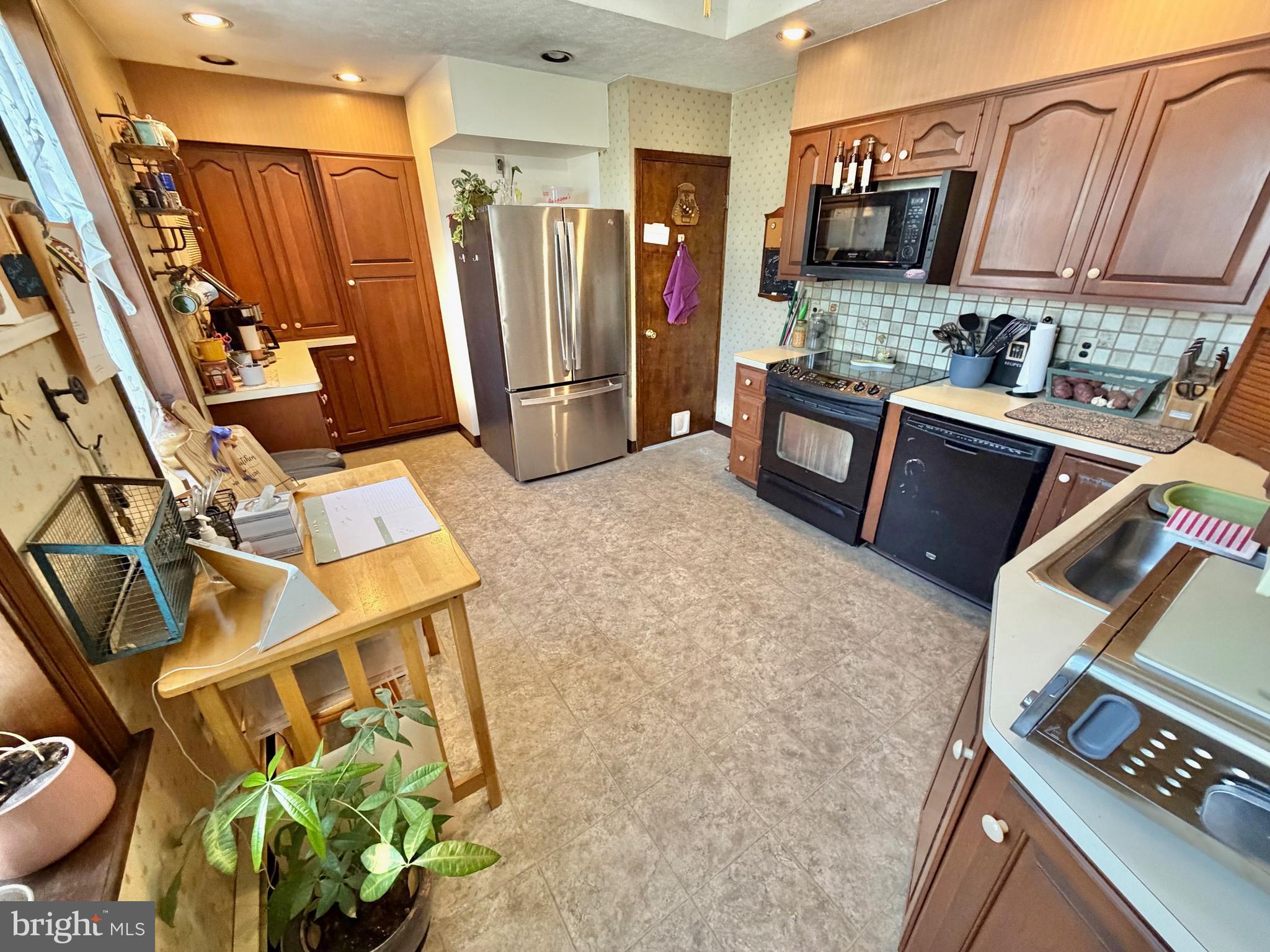 126 4th Avenue Roebling, NJ 08554 - Photo 4 of 43 a view of a kitchen with furniture and a window