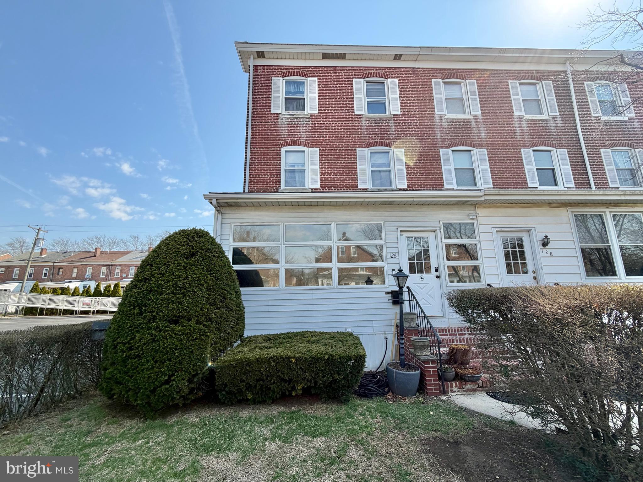 126 4th Avenue Roebling, NJ 08554 - Photo 43 of 43 a view of a brick house with a yard