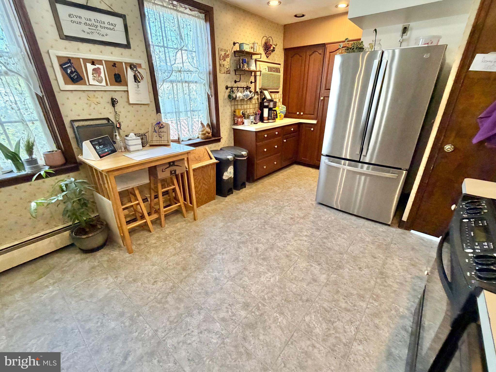 126 4th Avenue Roebling, NJ 08554 - Photo 8 of 43 a room with furniture and a refrigerator