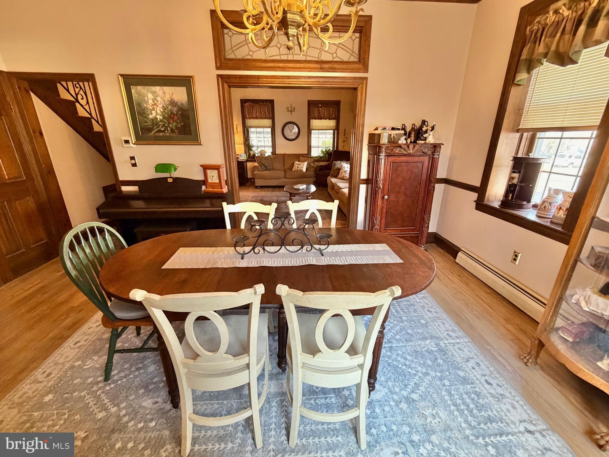 126 4th Avenue Roebling, NJ 08554 - Photo 10 of 43 a view of a dining room with furniture and wooden floor