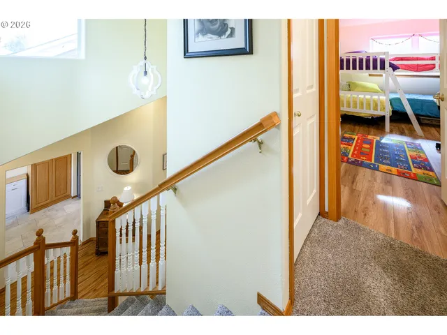a view of a hallway with seating area